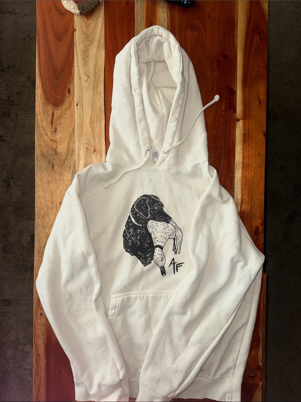 Cream Graphic Hoodie with Black Dog & Duck Illustration